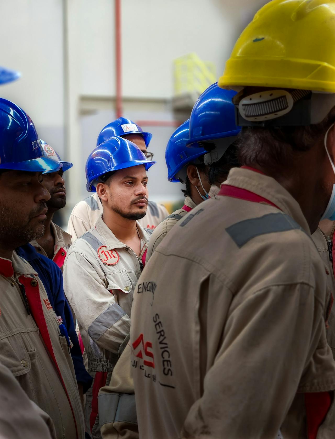 Construction workers in hard hats on a building site